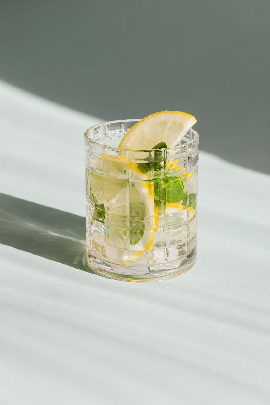 glass of fresh drink on white background