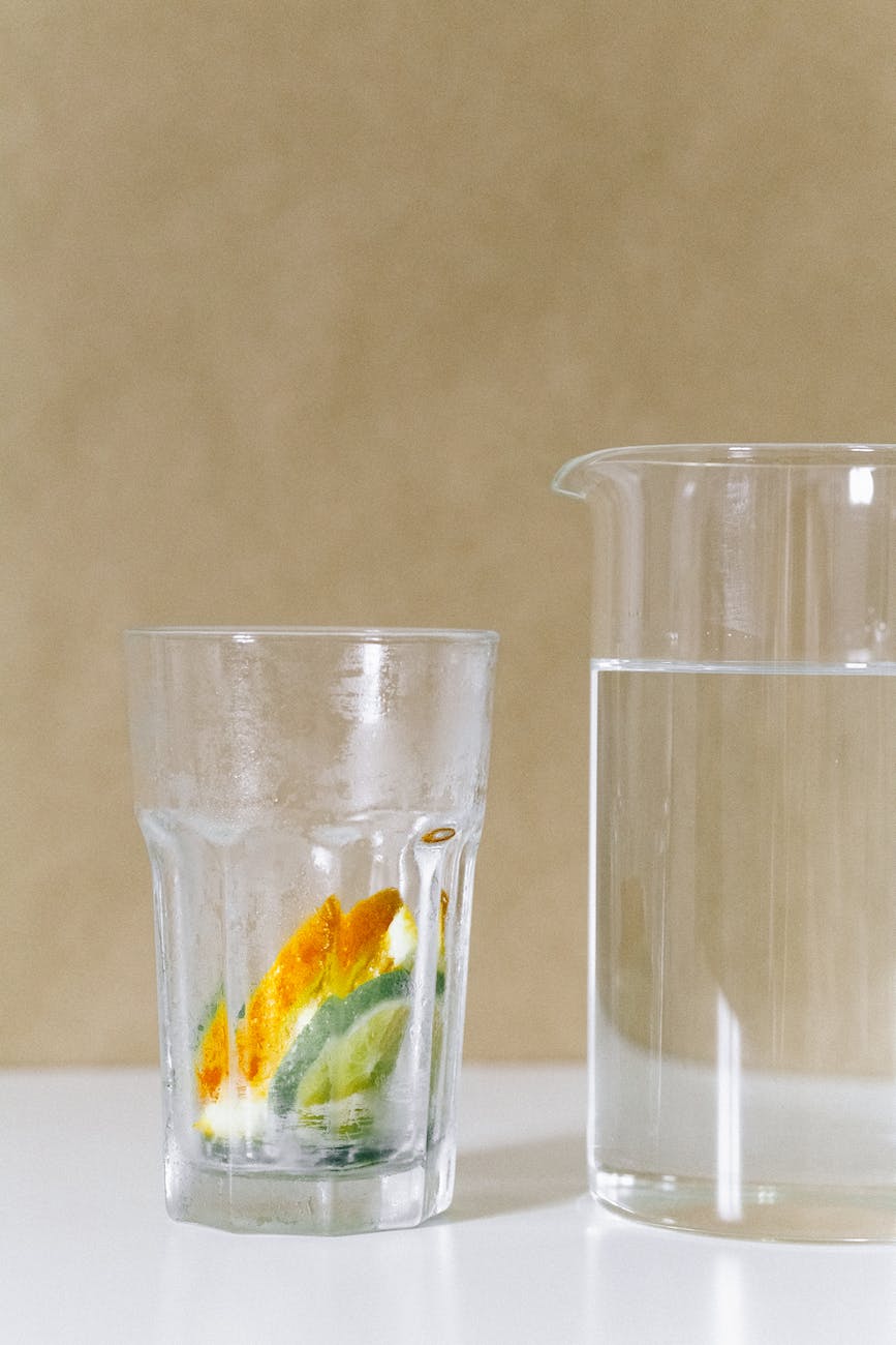 drinking glass with sliced of lemon