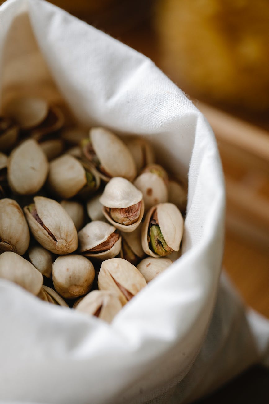 heap of pistachios in bag