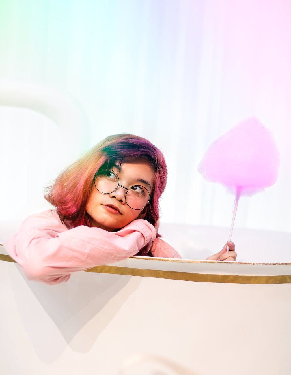 woman holding cotton candy