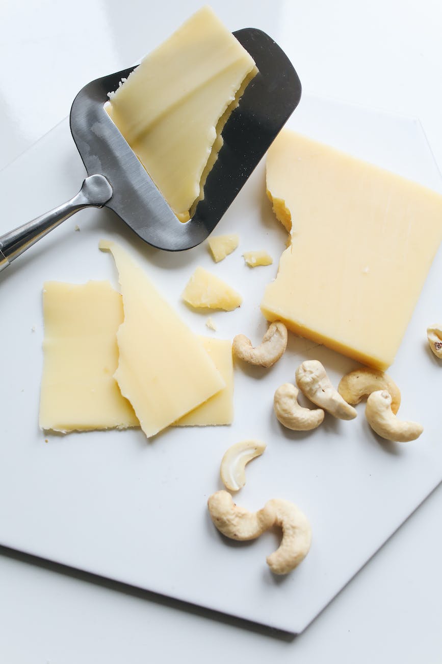 photo of sliced cheese on spatula