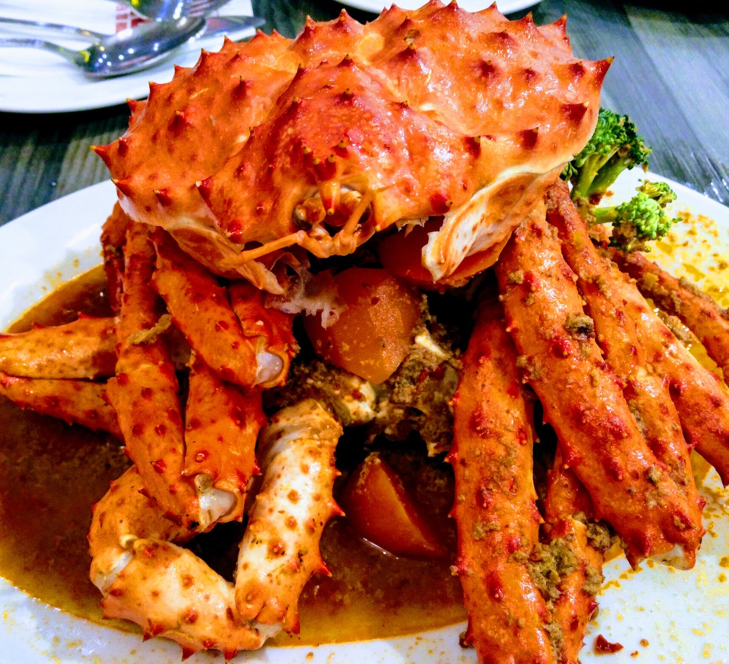 cooked crab on white ceramic palte